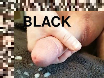 Cumshot over Black Towel - Lots of Cum