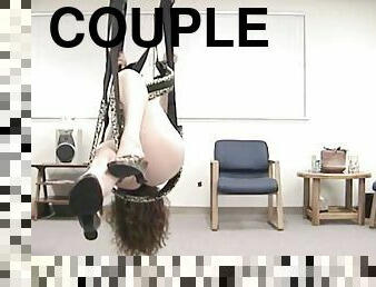 Horny couple use sex swing