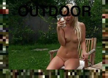 Outdoors solo clip with a very naughty blonde babe