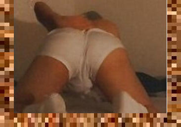 Young slut twink twerks in white shorts and socks on bed