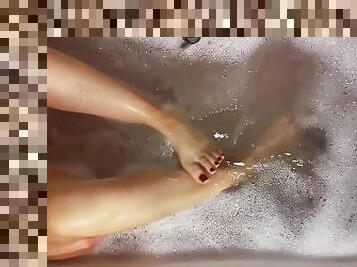 Relaxing during a warm bath with my feet