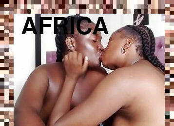 Two pretty African girls experience their first time Lesbian scene in front of the webcam.