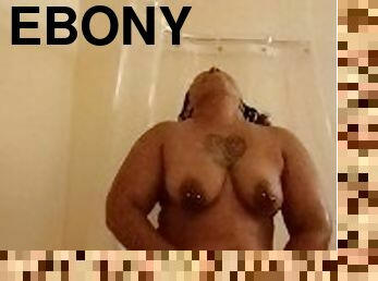 Ebony MILF uses vibrator in the shower