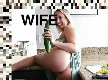 Home alone wife is set to bang her wet cunt with a huge cucumber