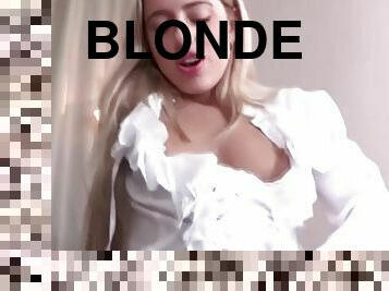 This gorgeously dressed blonde is pissing in pantyhose