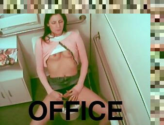 Office slut masturbates while fingering herself
