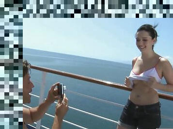 Brunette babe has fun with a dick on a huge boat