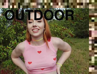 Smiley redhead teen Arietta Adams gets fucked outdoors