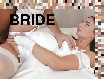 RIM4K. A gorgeous brunette in a wedding dress worships the bride and groom