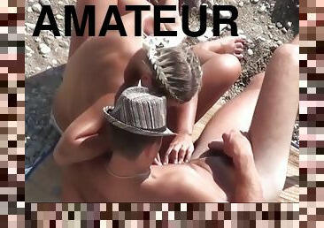 Gorgeous blonde masturbate her boyfriend on the nudist beach