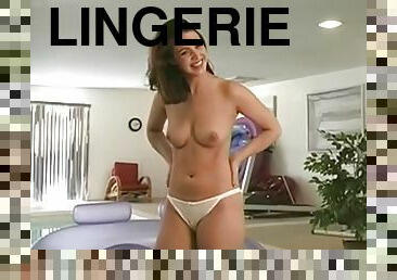 Lusty brunette in white lingerie shows off body