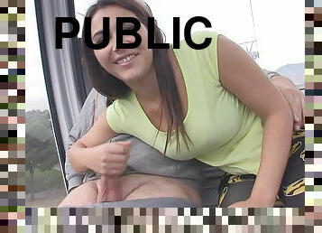 Big tit Latina blows cock in public telecabine