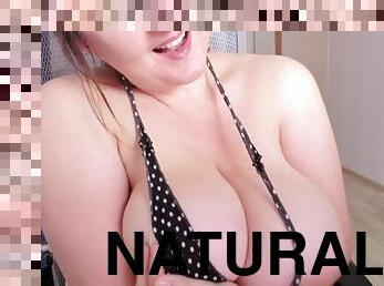 Brunette with giant natural tits