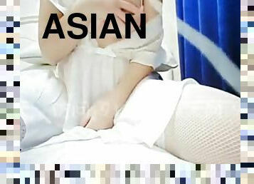 Asian girl masturbates