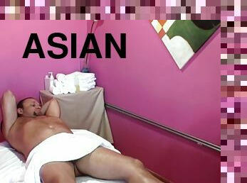 Bigtitted asian masseuse client tug cock