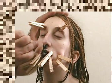 Cute amateur with clothes pins on her pretty face