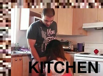 Fit girl sucks dick on her knees in the kitchen