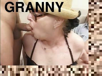 Granny in glasses does a dirty gangbang