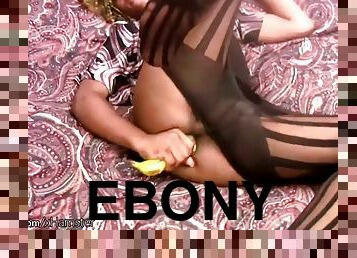 Ebony blonde tranny in pantyhose plays with banana and squirts