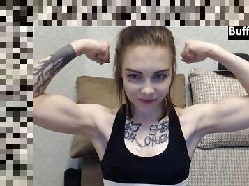 Teen flexing biceps