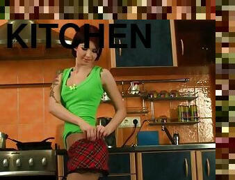 Young pantyhose girl in kitchen
