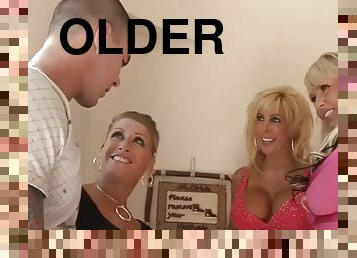 Pussy eating and cocksucking older women fucked in a foursome