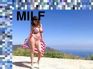 Ava addams wearing bikini poses with the flag of america