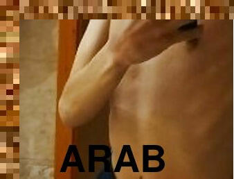 TUMMY PIERCED ARAB TEEN GUY SHOWS OFF HIMSELF IN THE MIRROR