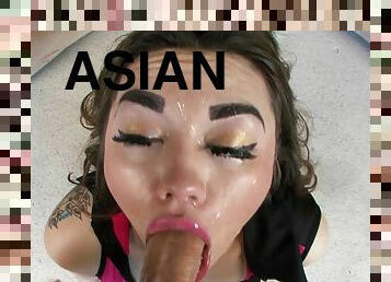 Asian babe sucking a fat cock