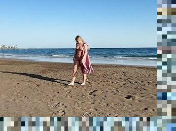 Girl Walking on the beach and flashing body on public