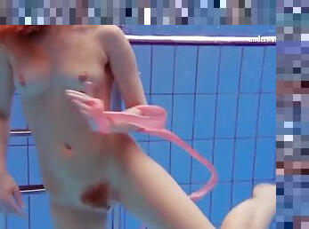 Katka Matrosova swims naked alone in the pool