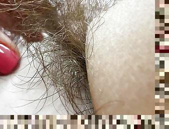 Hairy pussy in white swimsuit closeup