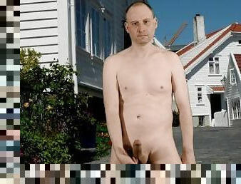 Kudoslong naked his shaved cock is erect as he wanks outside on a street