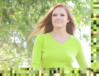 Redhead teen takes off her clothes in public