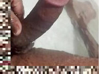 Stroking my thick black dick in the tub