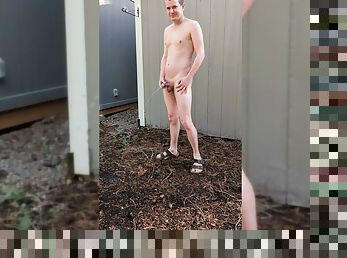 Nude guy in sandals peeing freely outside in the open air