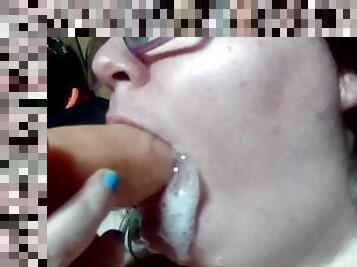 sucking a dildo and swallowing cum