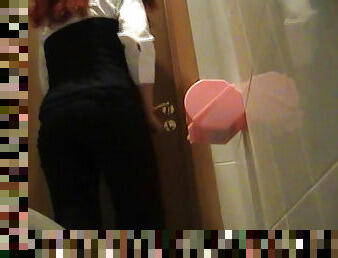 Hottest redhead model is peeing in the toilet