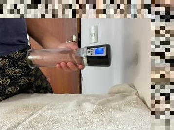 Big dick getting sucked by the suction of an automatic penis pump