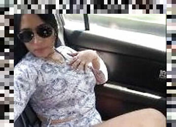 Hot girl with tattoos records herself very sensual in the car