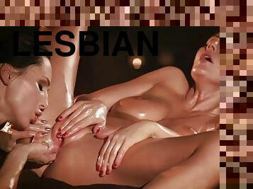 Erotic petite lesbians rub oiled pussies, fingering b4