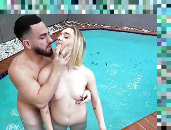 Appealing young blonde gets started into the pool and completes her porn fantasy in bed