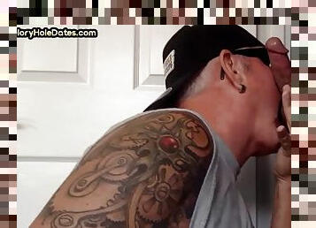 Tattooed oral dilf sucks cock at glory hole until cum in mouth
