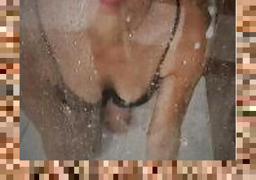 hot blonde licks sperm off the wall of the shower cabin