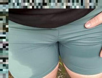 Girl has extreme wetting desperation accident in shorts walking outside