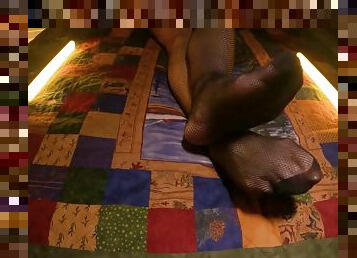 Sensual Soles: Perfect Feet Peek through Fishnet Pantyhose