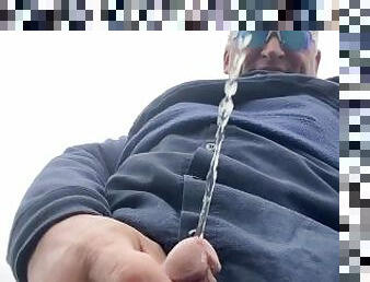 Peeing in public and playing with my cock